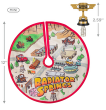 Load image into Gallery viewer, Miniature Disney/Pixar Cars Radiator Springs Tree Topper and Christmas Tree Skirt Set