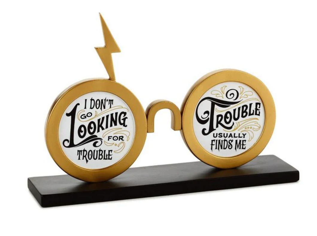 Harry Potter™ Trouble Finds Me Eyeglasses Quote Sign